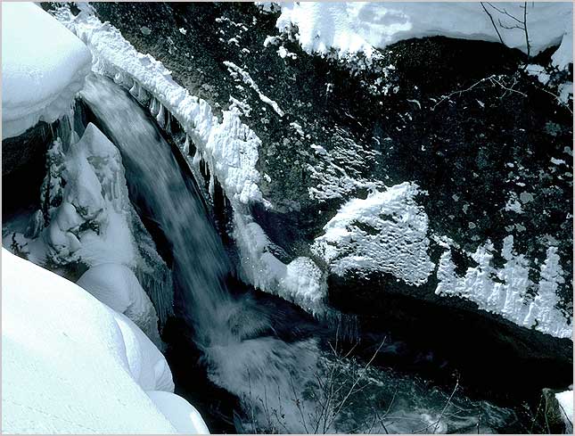 winter cascade, the alps